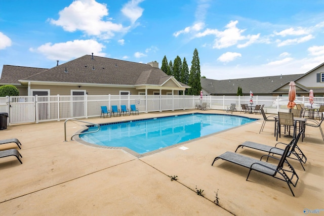 164 Moore Farm Cir NW, Huntsville, AL 35806 - community pool featuring a patio and fence