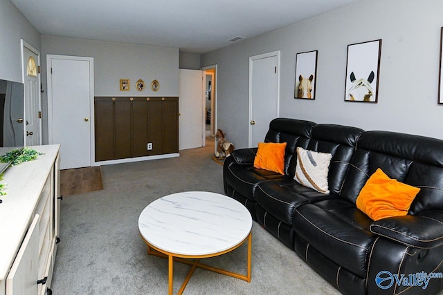 living room featuring light colored carpet