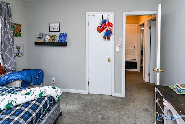 bedroom featuring carpet