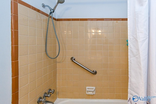 bathroom featuring shower / bathtub combination with curtain