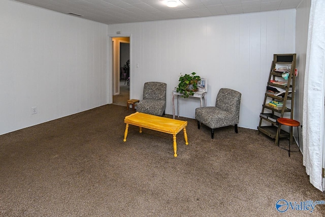 living area featuring carpet flooring