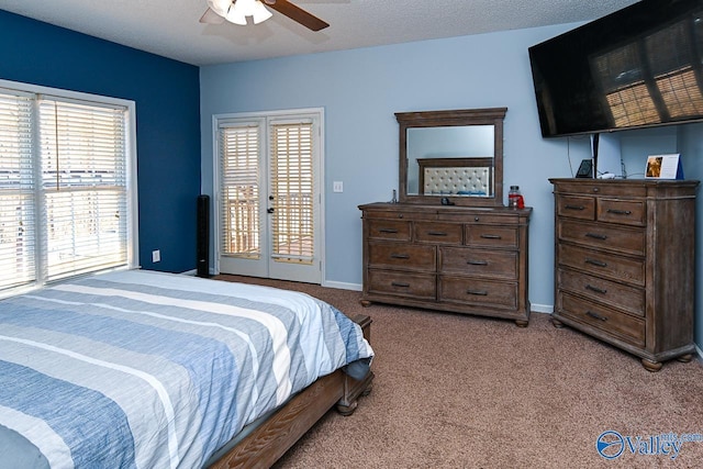 carpeted bedroom featuring ceiling fan, a textured ceiling, baseboards, access to exterior, and french doors