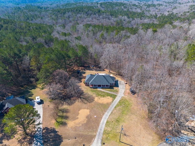 bird's eye view featuring a view of trees