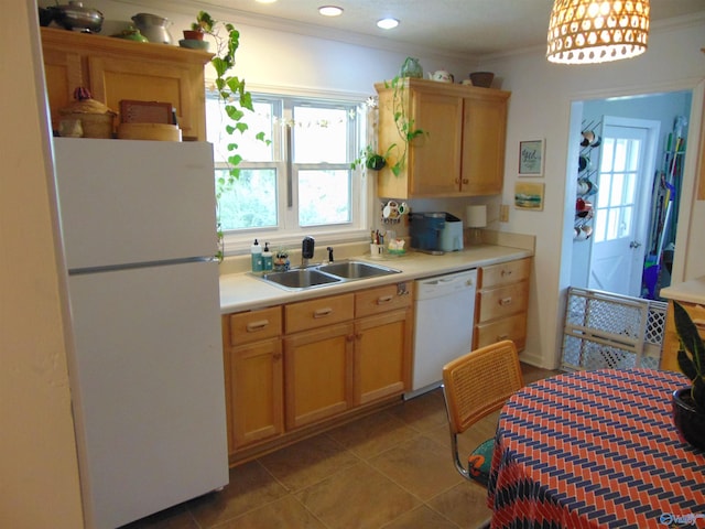 kitchen featuring light tile patterned floors, crown molding, sink, and white appliances