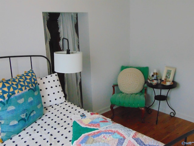 bedroom featuring hardwood / wood-style flooring