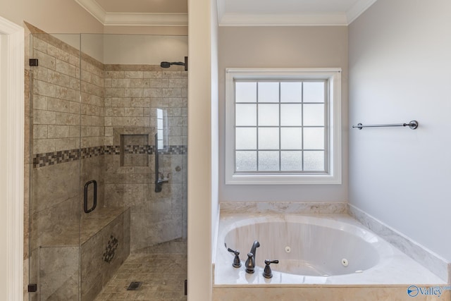 bathroom featuring ornamental molding and shower with separate bathtub