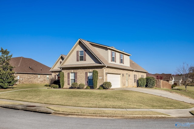 view of front property with a garage and a front lawn