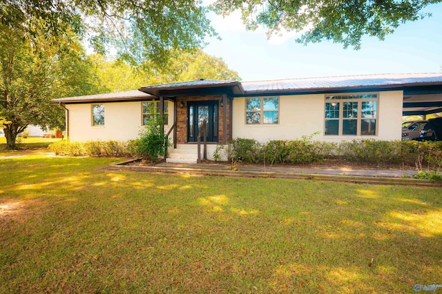 view of front of property with a front lawn