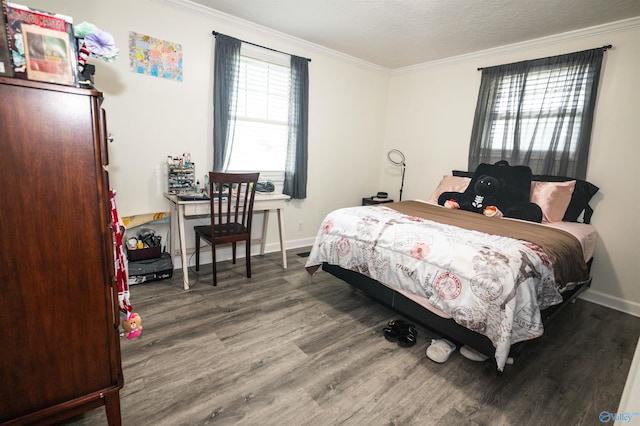 bedroom with a textured ceiling, multiple windows, dark hardwood / wood-style floors, and crown molding