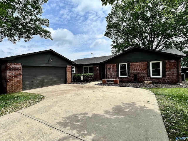 2704 Mctavish Ave SW, Decatur, AL 35603 - single story home featuring an attached garage, brick siding, and concrete driveway