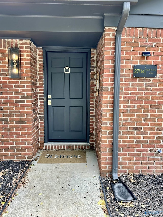 2704 Mctavish Ave SW, Decatur, AL 35603 - doorway to property featuring brick siding