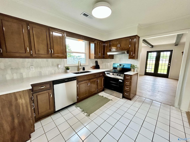 2704 Mctavish Ave SW, Decatur, AL 35603 - kitchen with stainless steel appliances, a sink, light countertops, tasteful backsplash, and ornamental molding
