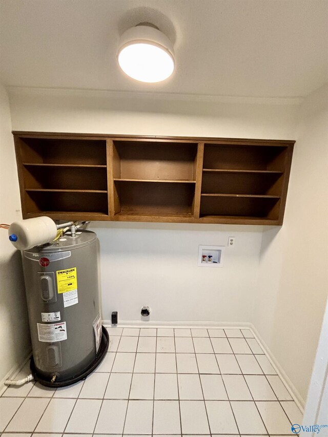 2704 Mctavish Ave SW, Decatur, AL 35603 - clothes washing area with water heater, washer hookup, electric dryer hookup, and baseboards