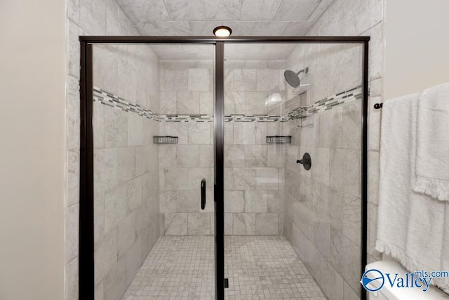 bathroom with an enclosed shower