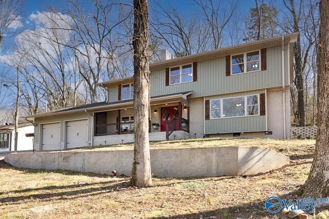 front of property featuring a garage