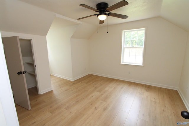 233 Shaw Rd NW, Hartselle, AL 35640 - bonus room featuring lofted ceiling, a ceiling fan, light wood-style flooring, and baseboards