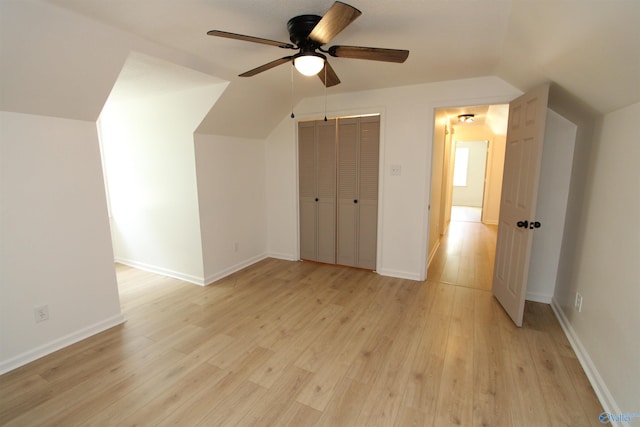 233 Shaw Rd NW, Hartselle, AL 35640 - additional living space with a ceiling fan, vaulted ceiling, light wood-style floors, and baseboards