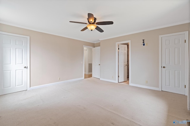 unfurnished bedroom with light carpet, crown molding, and ceiling fan