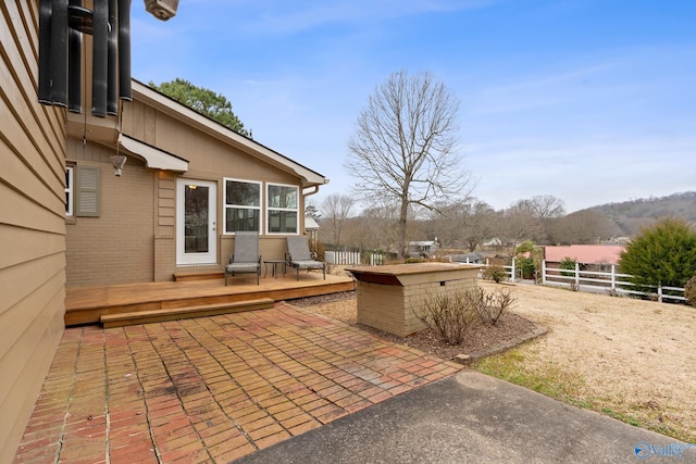 view of patio with a wooden deck