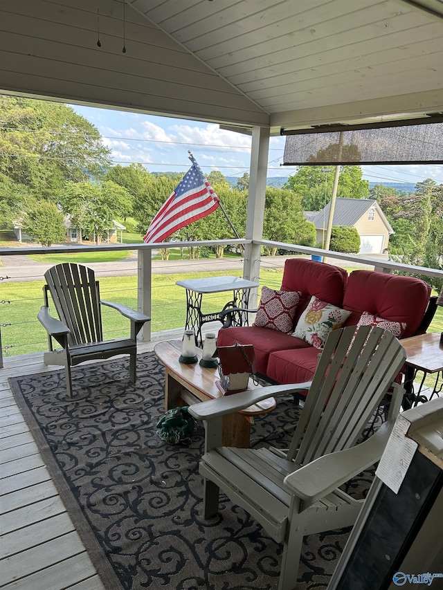 deck featuring a lawn