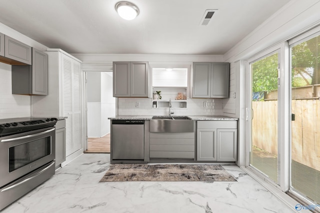 412 Oshaughnessy Ave NE, Huntsville, AL 35801 - kitchen featuring dishwasher, gray cabinets, stainless steel electric stove, a sink, and light marble finish floors