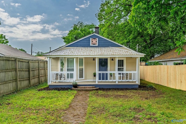 412 Oshaughnessy Ave NE, Huntsville, AL 35801 - view of front facade featuring covered porch