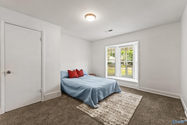 412 Oshaughnessy Ave NE, Huntsville, AL 35801 - bedroom featuring carpet floors and baseboards