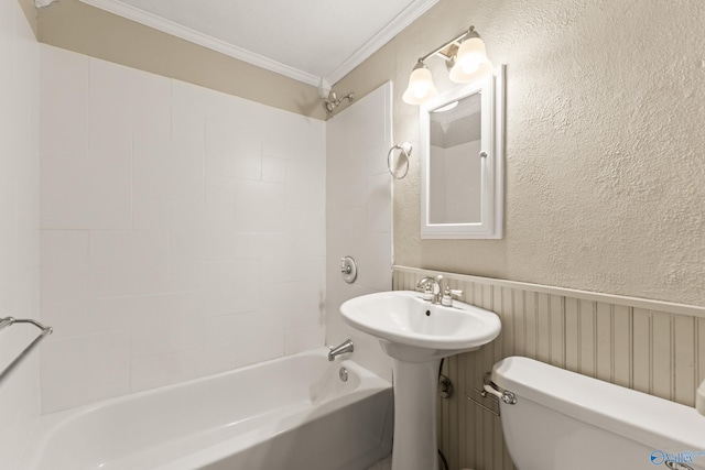 412 Oshaughnessy Ave NE, Huntsville, AL 35801 - full bath featuring ornamental molding, toilet, shower / bathtub combination, a textured wall, and a wainscoted wall