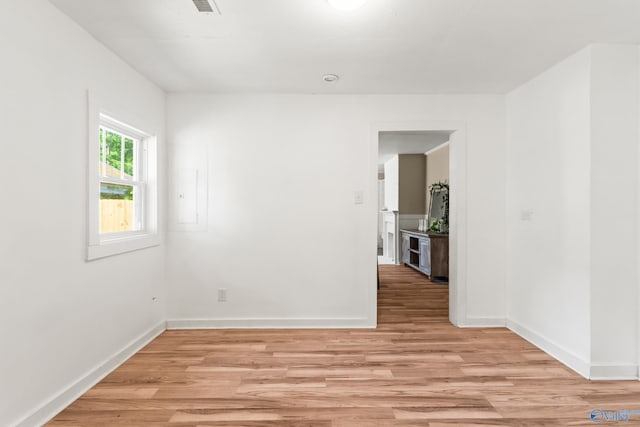412 Oshaughnessy Ave NE, Huntsville, AL 35801 - unfurnished room with light wood finished floors and baseboards