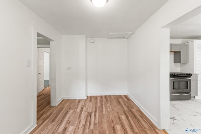 412 Oshaughnessy Ave NE, Huntsville, AL 35801 - spare room with baseboards and light wood-style floors