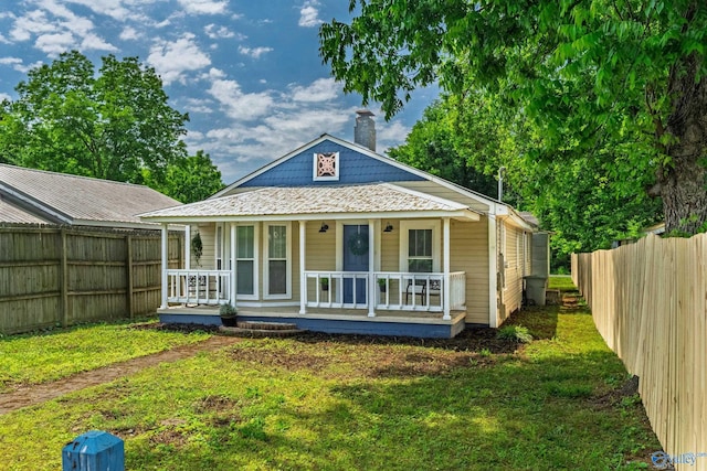 412 Oshaughnessy Ave NE, Huntsville, AL 35801 - view of front of property featuring covered porch and a chimney