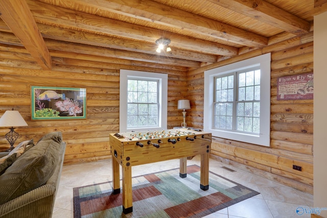 rec room featuring wood ceiling, beam ceiling, tile patterned floors, and rustic walls