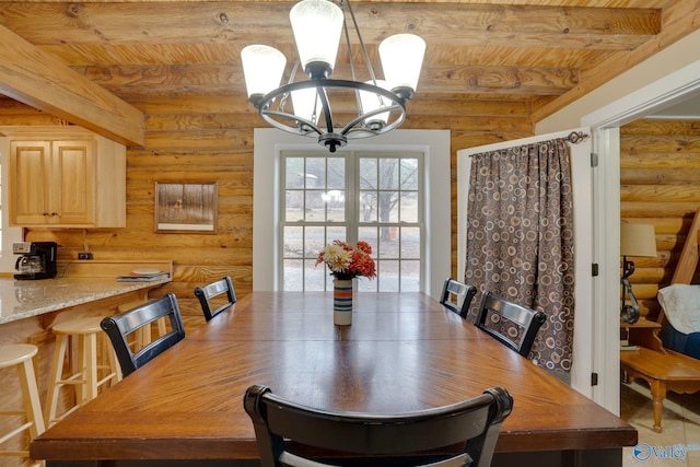 dining room featuring beamed ceiling, wood ceiling, rustic walls, and an inviting chandelier