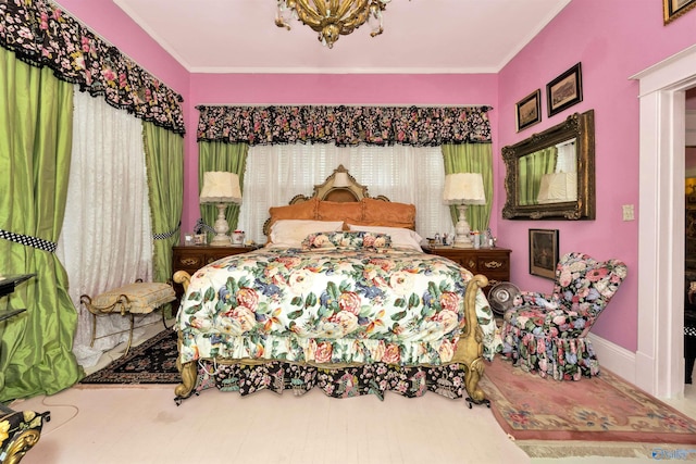 bedroom featuring crown molding