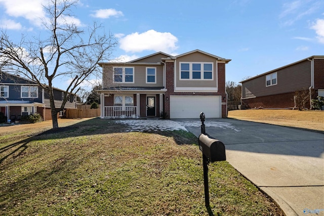 front of property featuring a porch, a front yard, and a garage