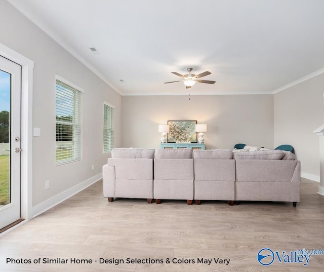 1112 Hine St, Athens, AL 35611 - living room with ceiling fan, ornamental molding, and light wood-type flooring