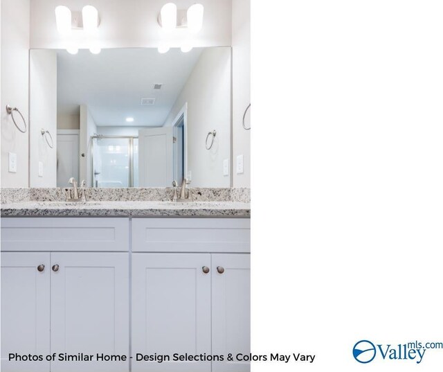 1112 Hine St, Athens, AL 35611 - bathroom featuring walk in shower and vanity