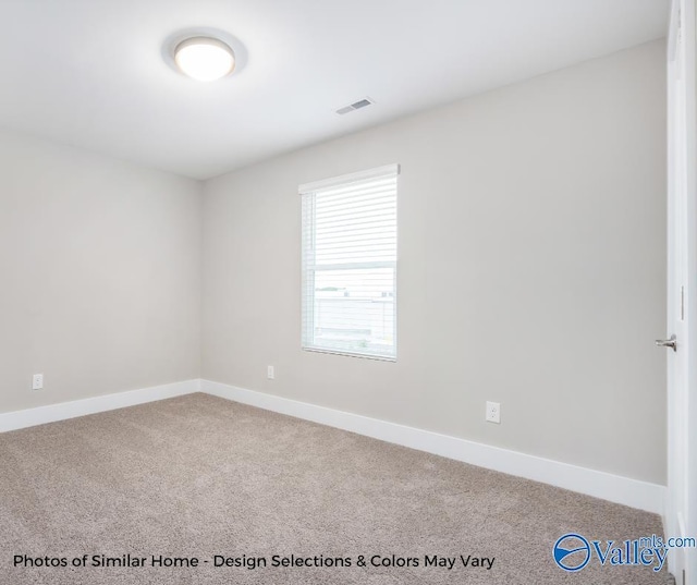 1112 Hine St, Athens, AL 35611 - spare room with carpet floors