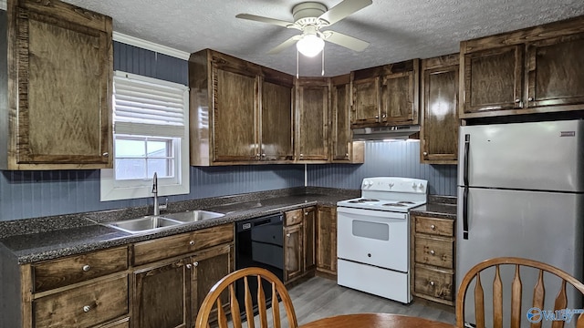 18222 Mcmunn Ln, Athens, AL 35614 - kitchen with white range with electric stovetop, stainless steel refrigerator, dishwasher, sink, and a textured ceiling