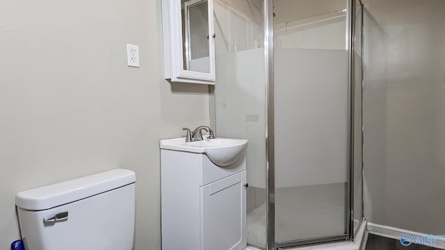 18222 Mcmunn Ln, Athens, AL 35614 - bathroom with vanity, toilet, and a shower with shower door