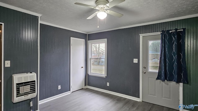 18222 Mcmunn Ln, Athens, AL 35614 - foyer entrance featuring hardwood / wood-style floors, ornamental molding, a wealth of natural light, and heating unit