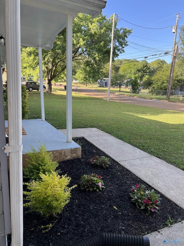 view of yard featuring a porch