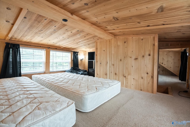 bedroom with beamed ceiling, carpet, wooden walls, and wood ceiling