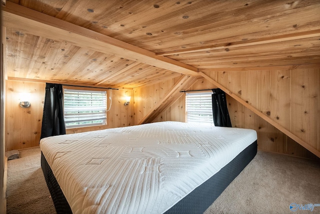 bedroom featuring carpet, wooden ceiling, and wooden walls