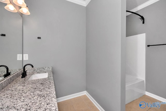 bathroom with vanity and crown molding