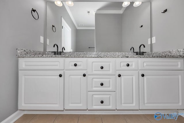 bathroom with vanity, tile patterned floors, and crown molding