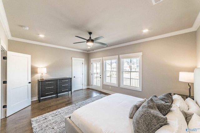 bedroom featuring ceiling fan, dark wood-type flooring, and ornamental molding