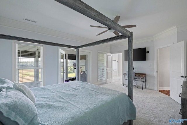 254 Whitlow Rd, Decatur, AL 35603 - carpeted bedroom with ornamental molding, multiple windows, ceiling fan, and ensuite bathroom