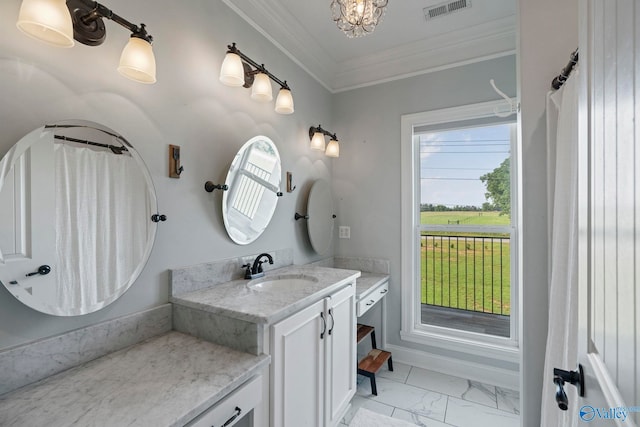 254 Whitlow Rd, Decatur, AL 35603 - bathroom featuring marble look tiles, vanity, ornamental molding, and a chandelier
