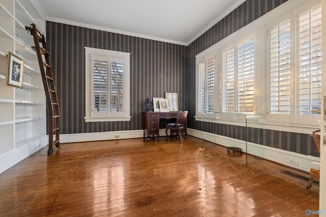 interior space featuring built in shelves, hardwood / wood-style floors, and ornamental molding